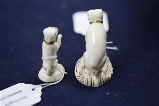 A rare Rockingham gilt and white porcelain figure of a begging pug and another of a seated pug, c.1826-30, 5.5cm and 6.5cm, former rest